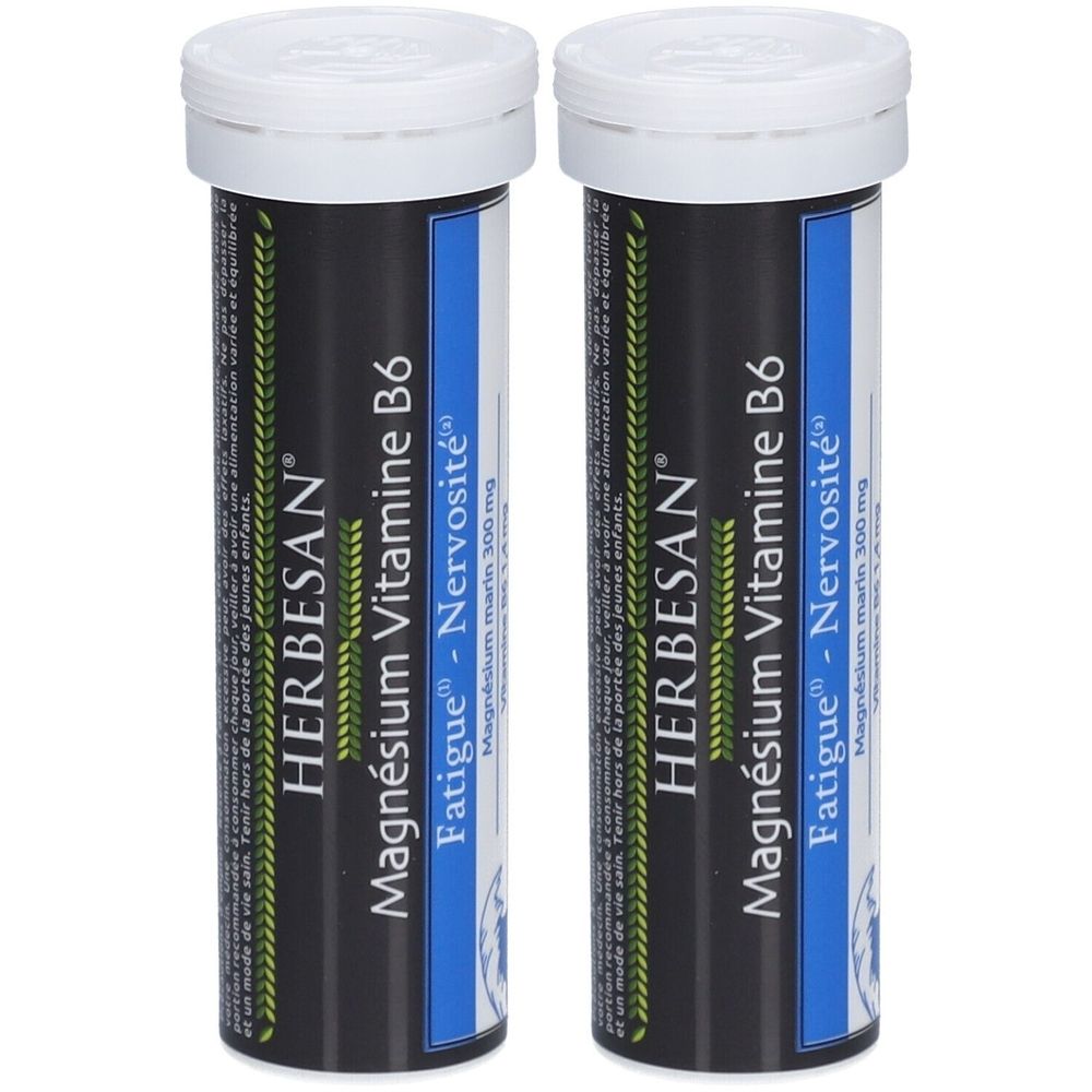 Deux tubes cylindriques. Inscription: HERBESAN, Magnésium Vitamine B6, Fatigue - Nervosité. Bouchons blancs, fond noir.