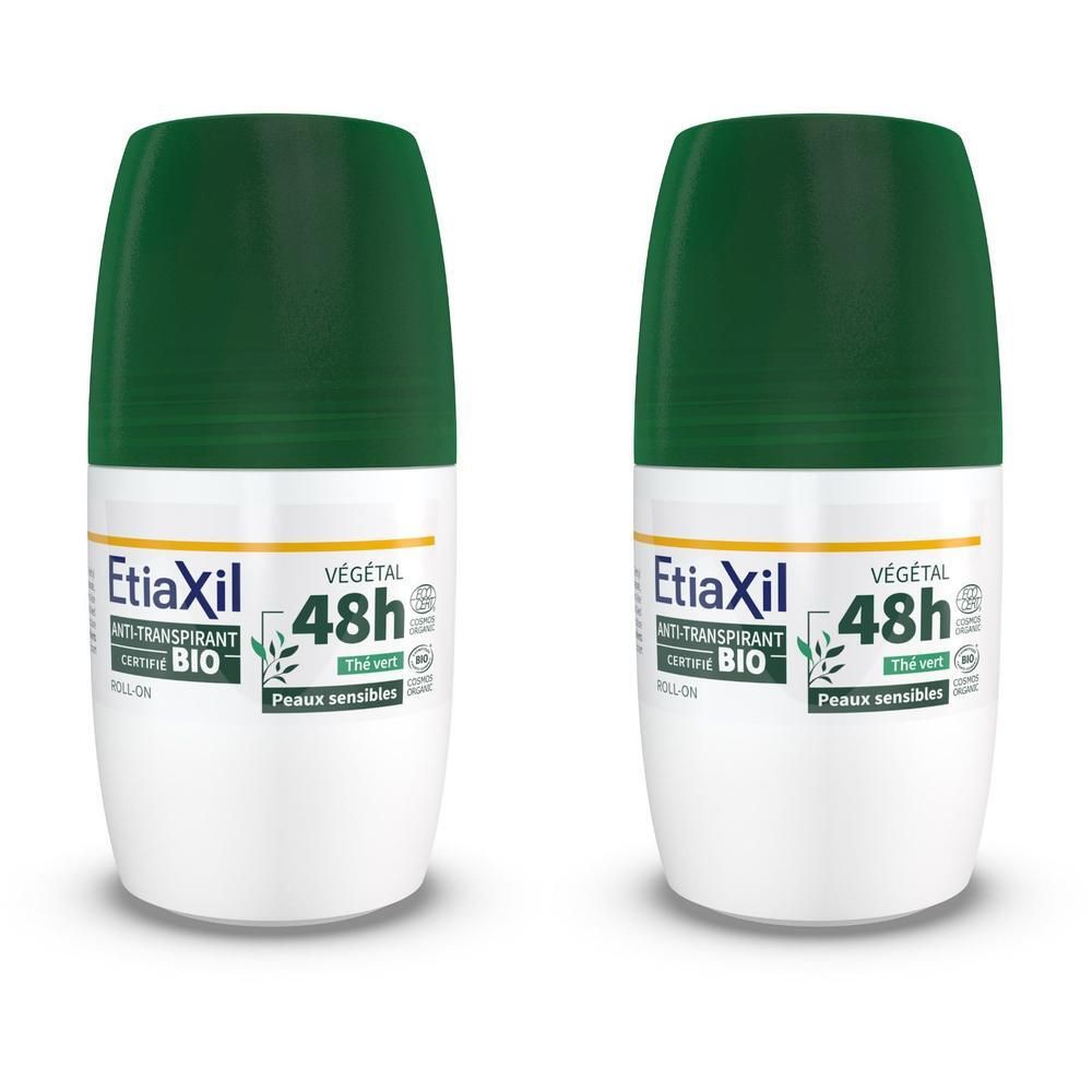 Deux déodorants roll-on avec bouchons verts. Inscription : Etiaxil, 48h, certification BIO.