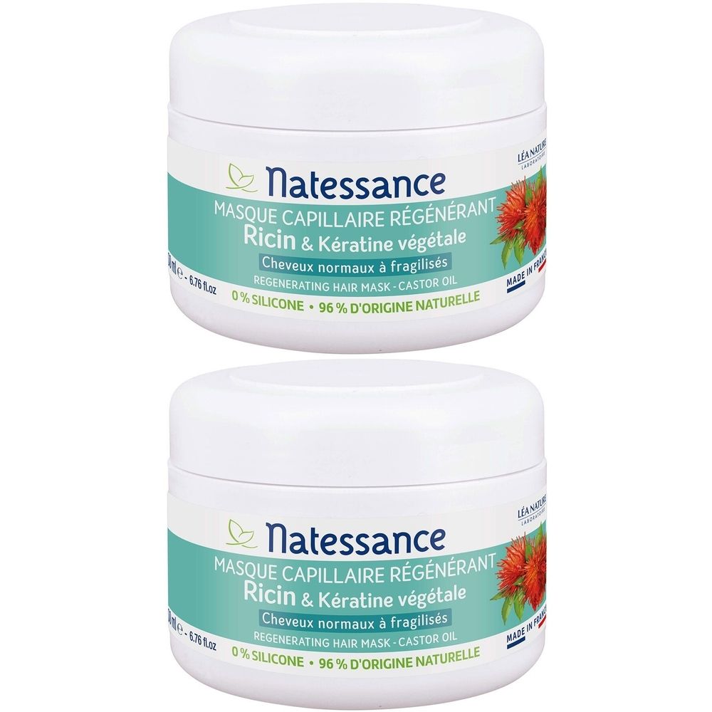 Deux pots blancs avec étiquettes vertes. Inscription: Natessance, masque capillaire régénérant à l'huile de ricin et kératine végétale. Pour cheveux normaux à fragilisés.