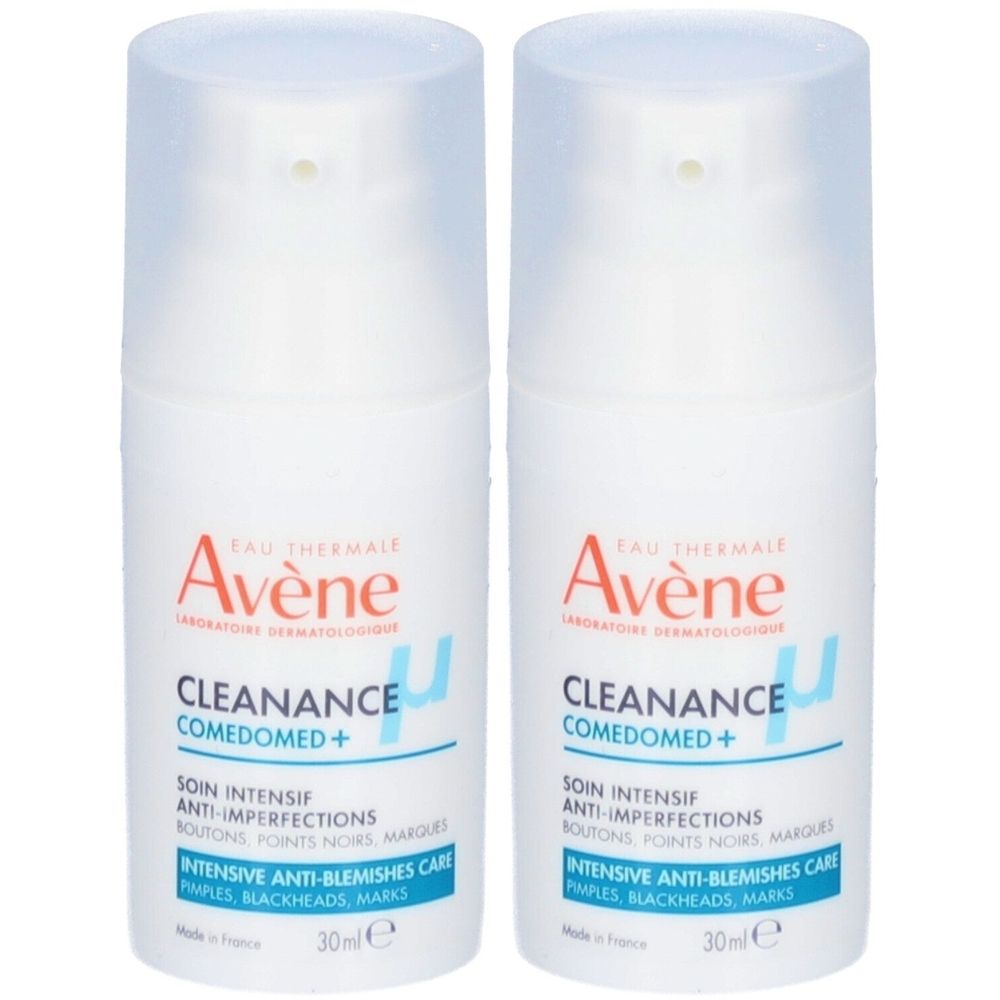 Deux flacons blancs avec bouchon pompe. Inscription: Avene, Cleanance Comedomed+. Texte: Soin intensif anti-imperfections. 30ml.
