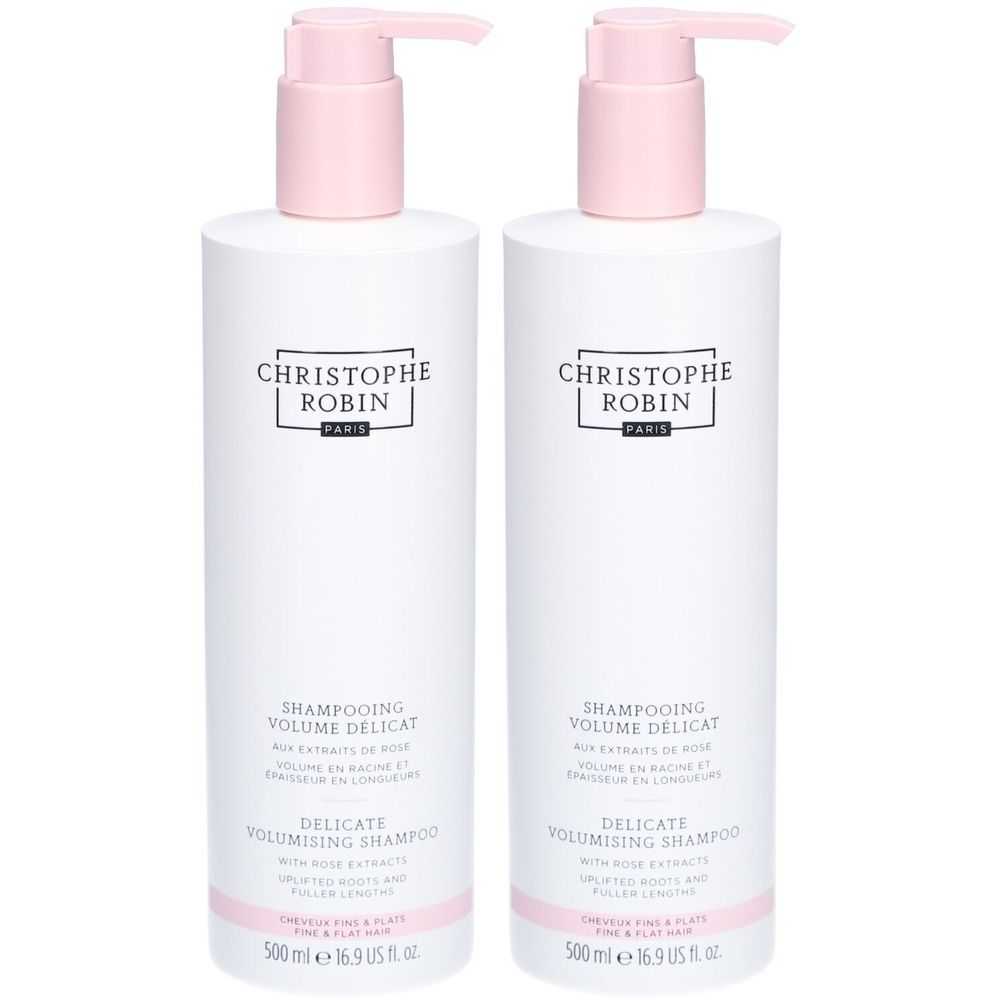 Deux flacons de shampooing blancs avec pompe rose. Inscription: CHRISTOPHE ROBIN. Texte: DELICATE VOLUMISING SHAMPOO. Volume: 500 ml.