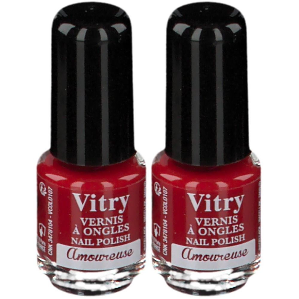 Deux flacons de vernis à ongles rouges. Flacons en verre avec bouchon noir. Inscription: Vitry, Vernis à Ongles, Nail Polish, Amoureuse.
