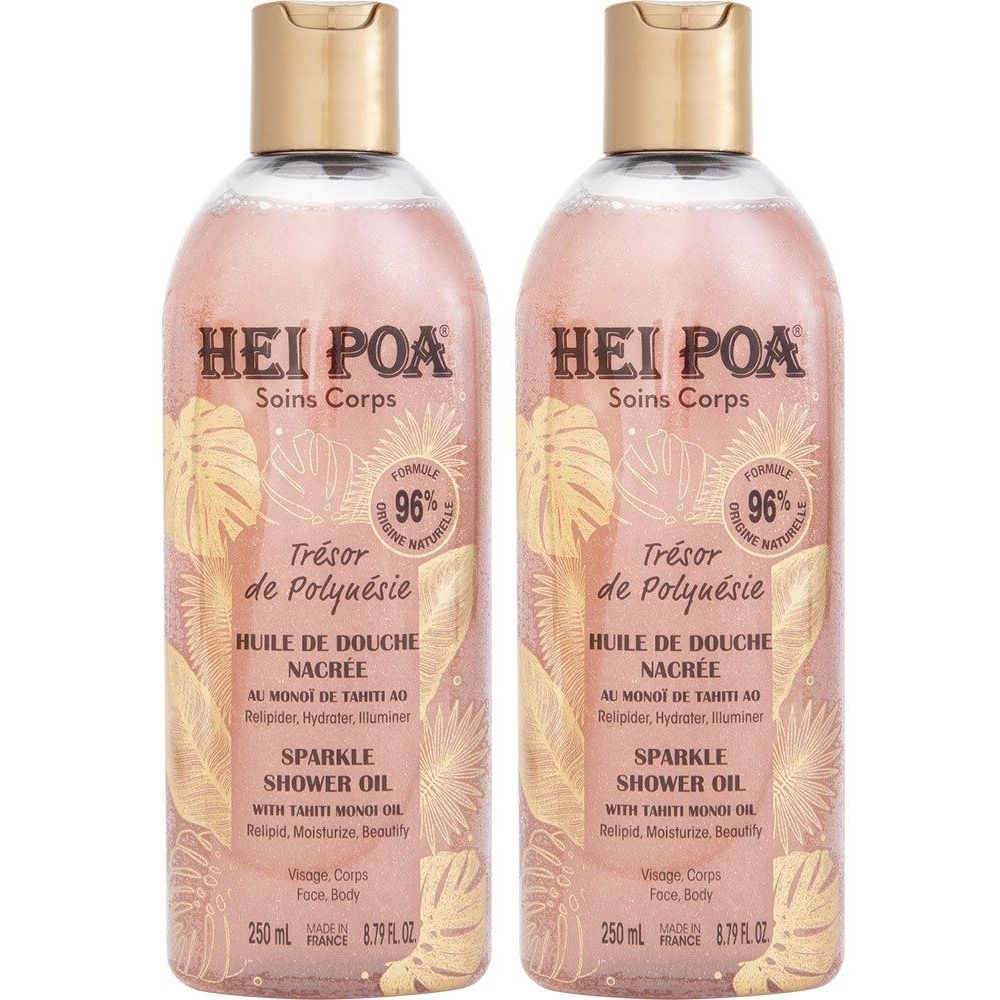 Deux flacons d'huile de douche Hei Poa. Liquide rose, bouchon doré. Inscription : Trésor de Polynésie, Sparkle Shower Oil.