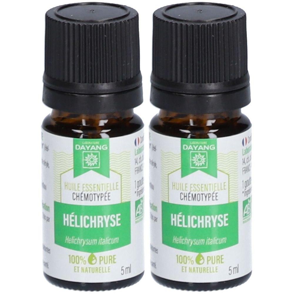 Deux flacons en verre brun avec bouchons noirs. Étiquettes avec "HÉLICHRYSE" et "100% PURE ET NATURELLE". Marque DAYANG.