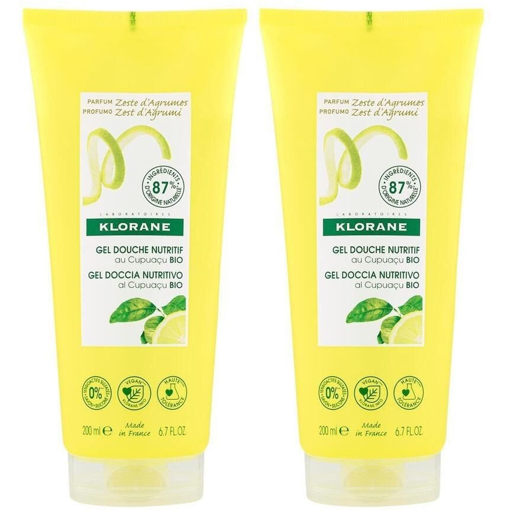 Deux tubes jaunes avec étiquette blanche. Inscription: KLORANE, Gel Douche Nutritif, Zeste d'Agrumes. Avec certification bio.