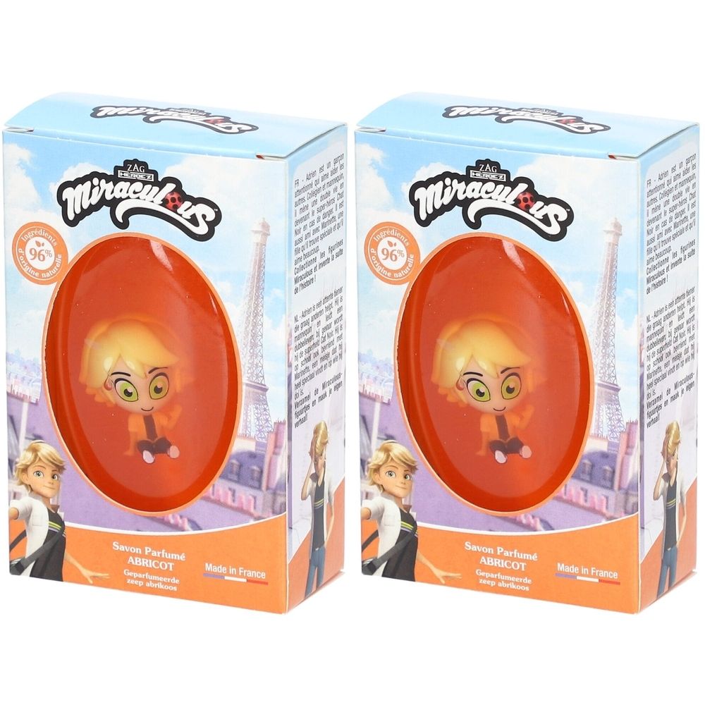 Deux boîtes avec figurine. Savon ovale orange avec figurine Adrien. Emballage avec logo et texte.