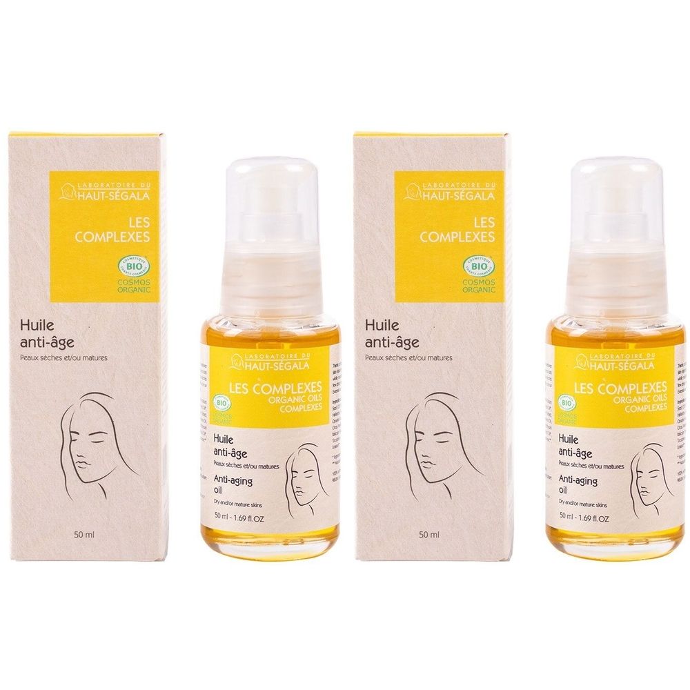 Plusieurs flacons et emballages. Inscription: LES COMPLEXES, Huile anti-âge. Certification bio. Flacons avec vaporisateur.