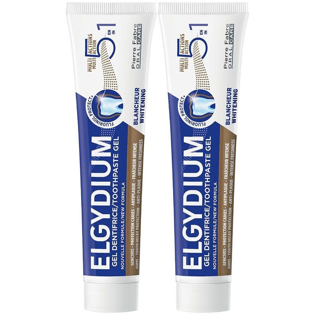 Deux tubes de dentifrice ELGYDIUM. Emballage blanc et bleu avec nom du produit et fonctions 5 en 1. Contient du Fluorinol.