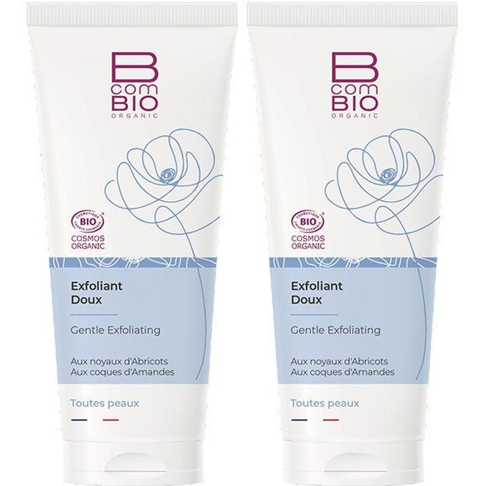 Deux tubes de B COM BIO ORGANIC Exfoliant Doux. Blancs, avec logo, dessin floral et texte. Certification bio.