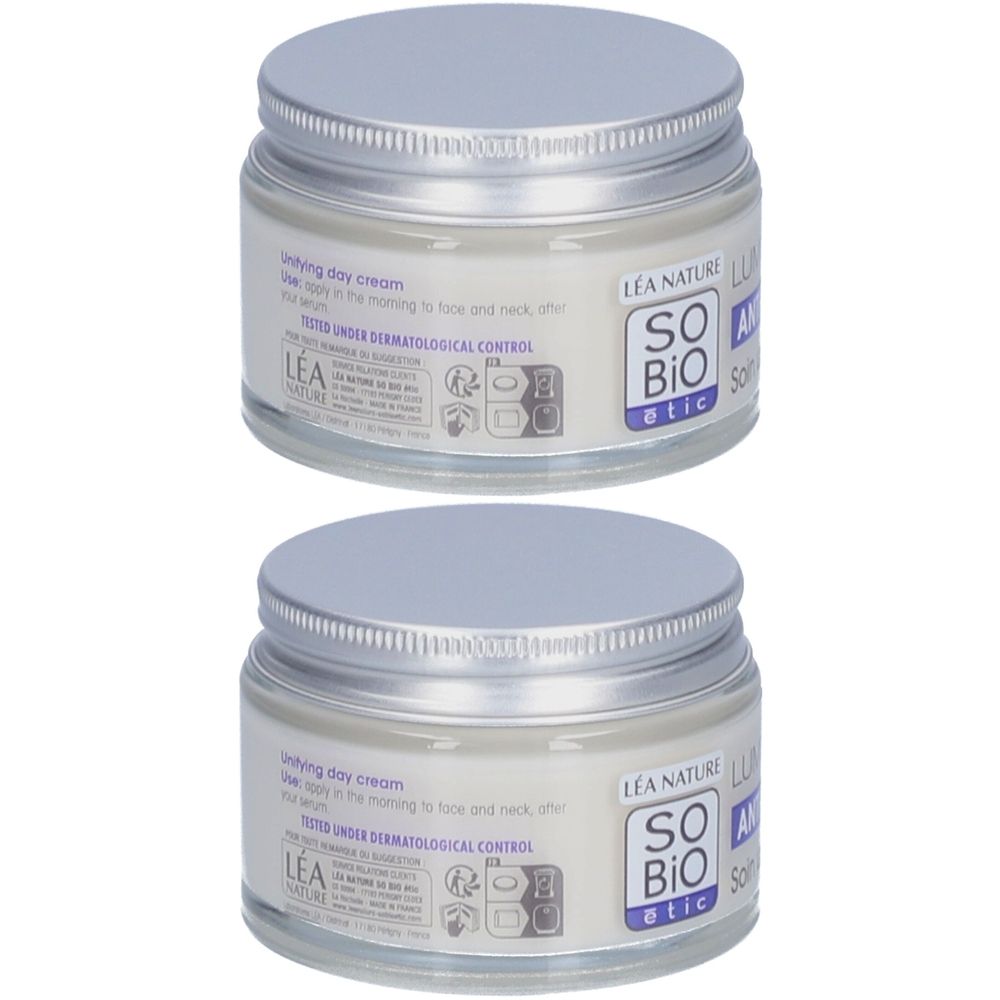 Deux pots de crème de jour SO BIO ETIC Lumi'Lys. Récipients en verre avec couvercles argentés. Inscriptions: SO BIO etic, LEA NATURE.