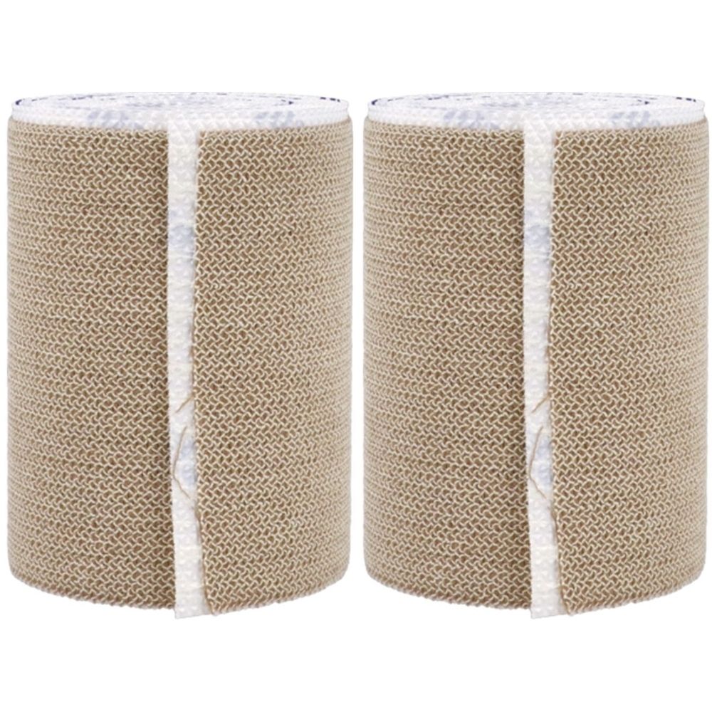 Deux rouleaux de ruban adhésif élastique. Beige, avec doublure intérieure blanche. Texture tissée. Enroulé.