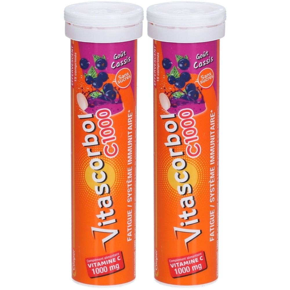 Deux tubes cylindriques avec bouchons blancs. Inscription: Vitascorbol C1000, goût cassis, vitamine C 1000 mg.