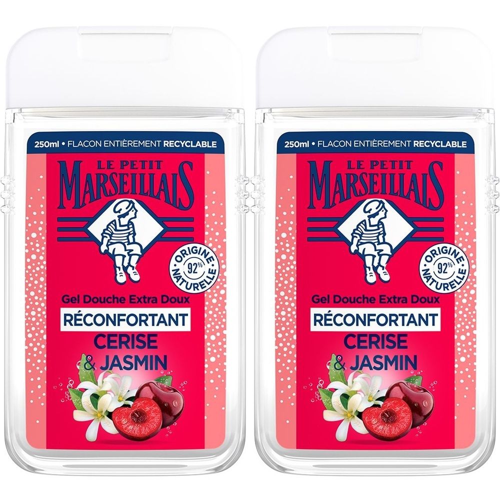 Deux flacons transparents avec étiquette rouge. L'étiquette indique "Le Petit Marseillais". Texte: Gel Douche Extra Doux Réconfortant Cerise & Jasmin.