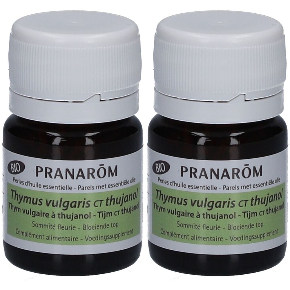 Deux flacons en verre brun avec bouchons blancs. Étiquettes avec texte: PRANAROM, Thymus vulgaris ct thujanol, certification BIO.