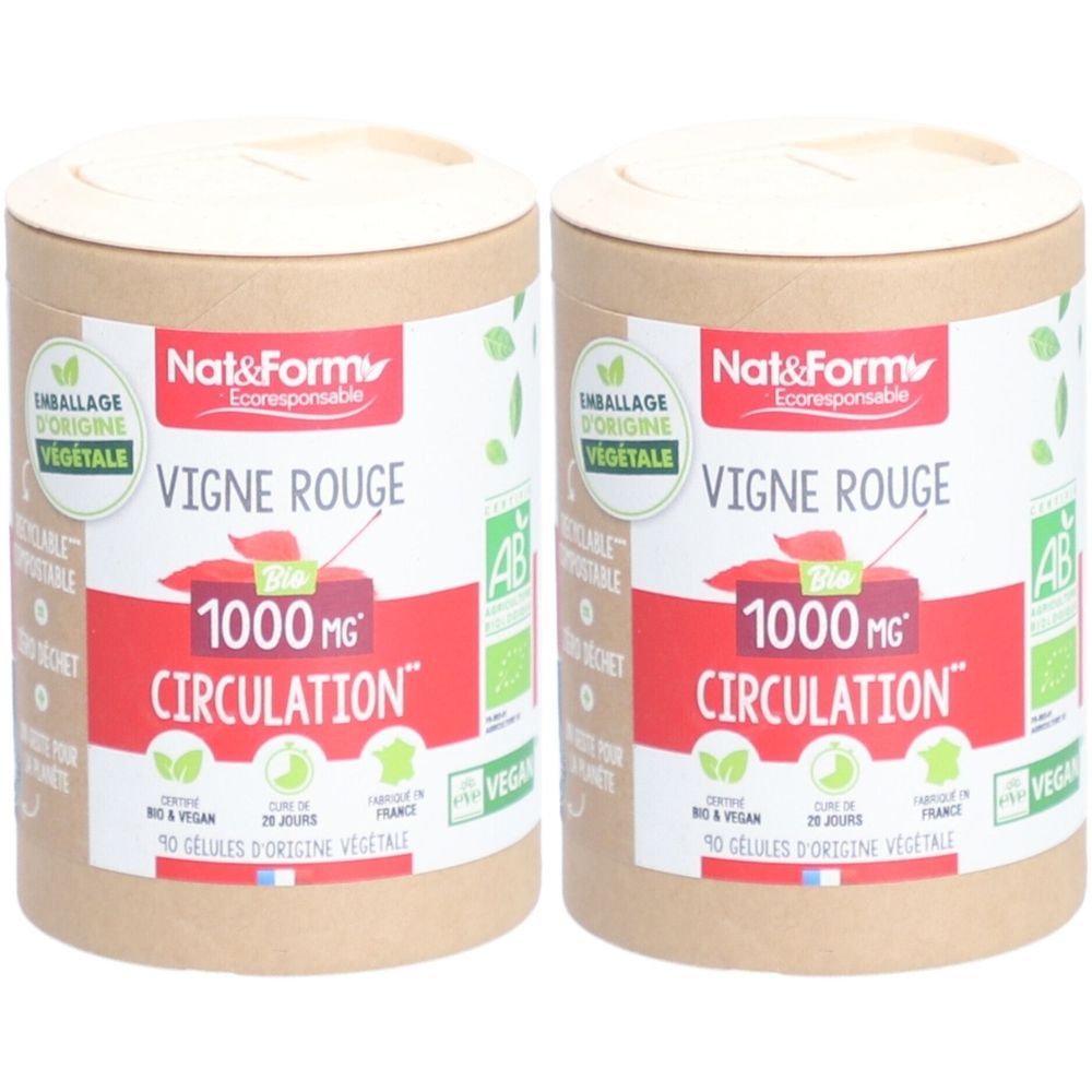 Deux boîtes cylindriques. Inscription : Vigne Rouge, 1000 MG Circulation. Avec label AB Bio et logo Vegan. Emballage d'origine végétale.
