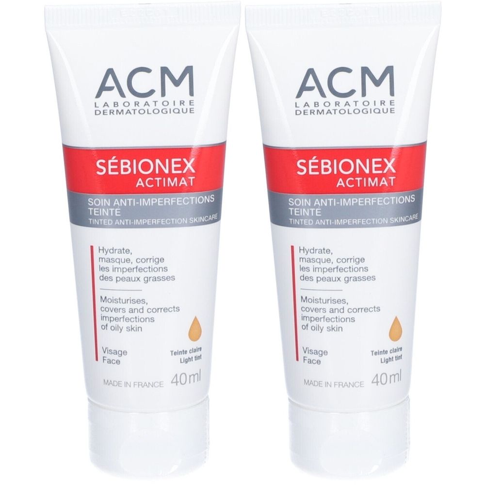 Deux tubes de ACM Sébionex Actimat. Tubes blancs avec bande rouge et informations produit. Inscription : Soin anti-imperfections teinté.