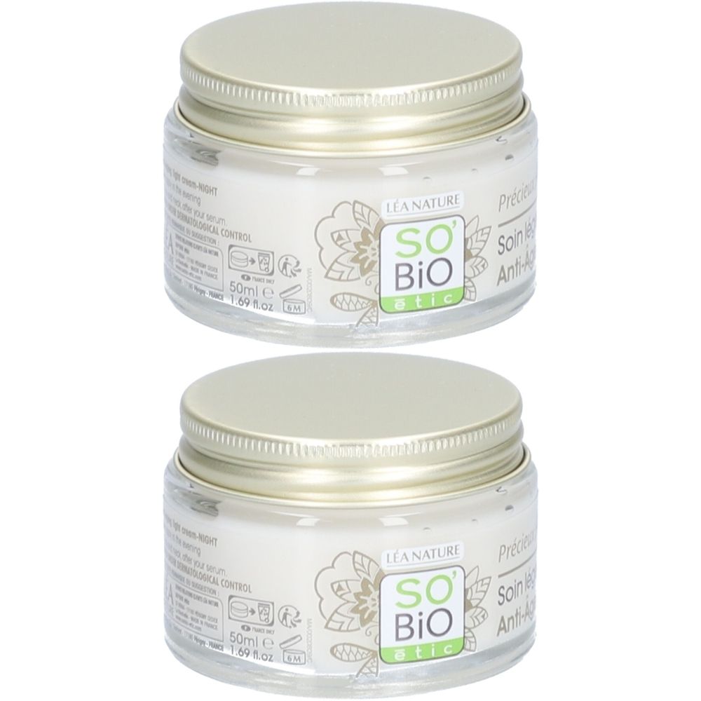 Deux pots de crème de nuit SO BIO ETIC. Récipients en verre avec couvercles argentés. Logos et mentions visibles.