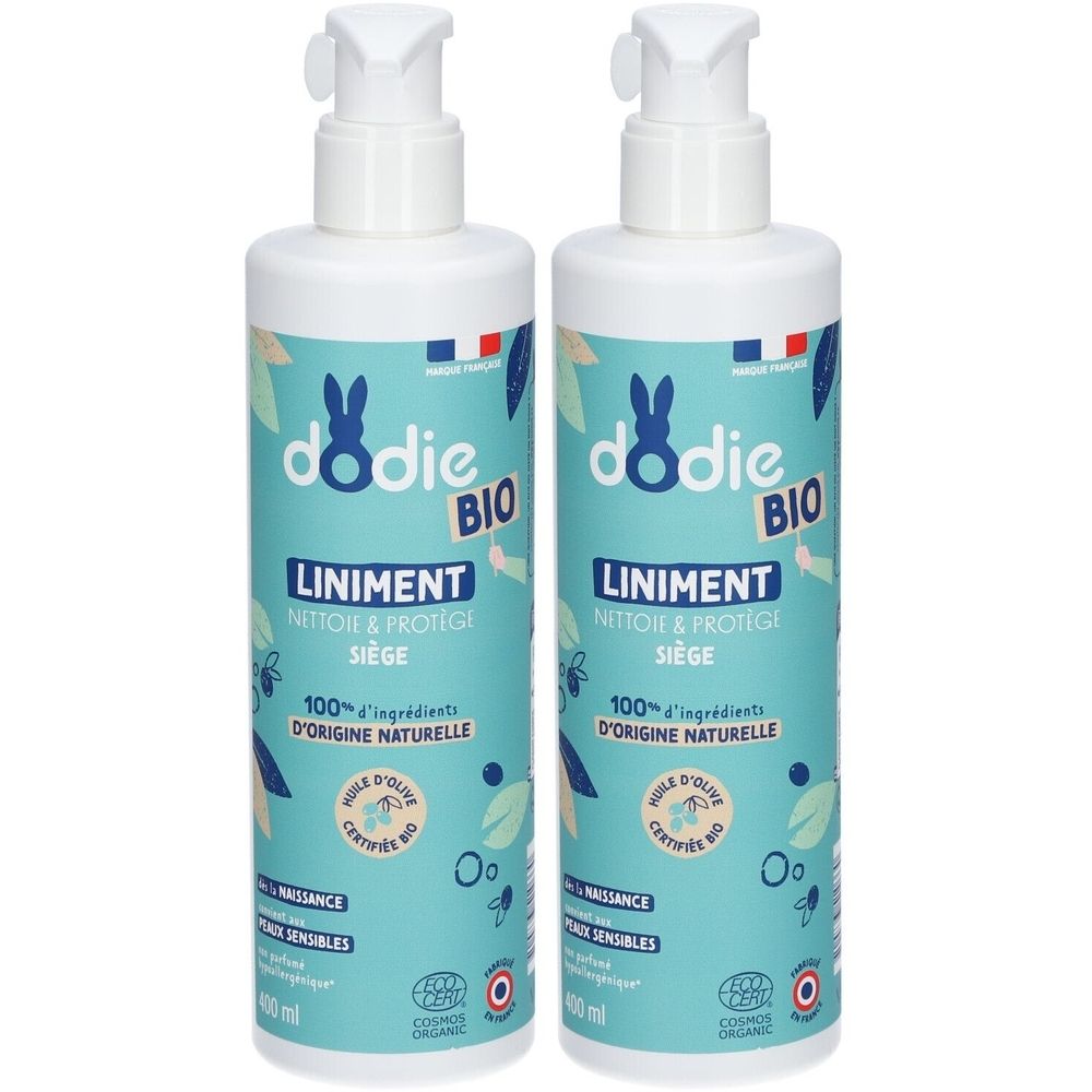 Deux flacons de Liniment BIO DODIE. Flacons bleu clair avec pompe blanche. Inscription : Liniment, 100% ingrédients naturels.