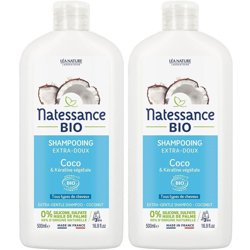 Deux flacons de shampooing blancs avec étiquettes bleues. Inscription: Natessance BIO Shampooing Extra-Doux Coco & Kératine végétale.