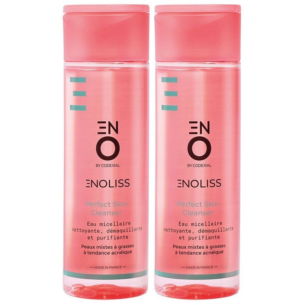 Deux flacons de Enoliss Perfect Skin Cleanser. Liquide rose dans des contenants cylindriques avec bouchons roses. Texte: ENOLISS, Perfect Skin Cleanser.