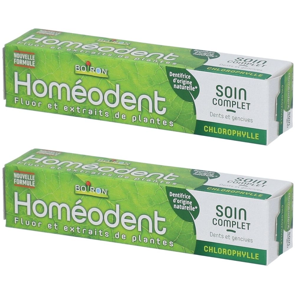 Deux boîtes de dentifrice Homéodent. Vert et blanc. Inscriptions : Fluor et extraits de plantes, Soin Complet, Chlorophylle.