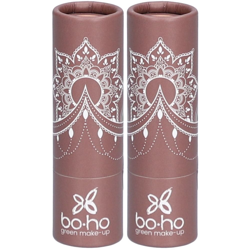 Deux tubes cylindriques bruns avec motifs blancs et logo. Inscription: bo-ho green make-up.