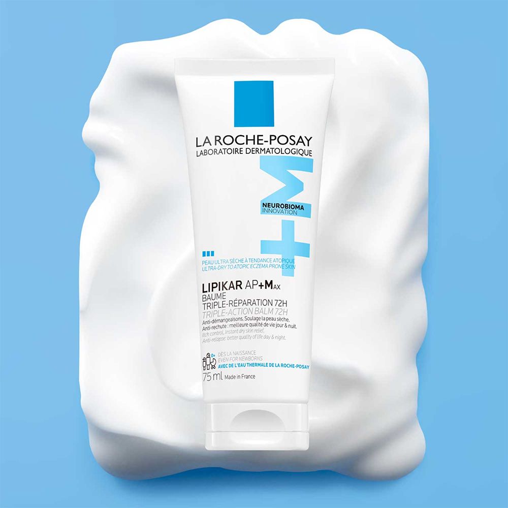Tube blanc sur mousse blanche. Logo bleu et inscription: La Roche-Posay, Lipikar Baume AP+M.