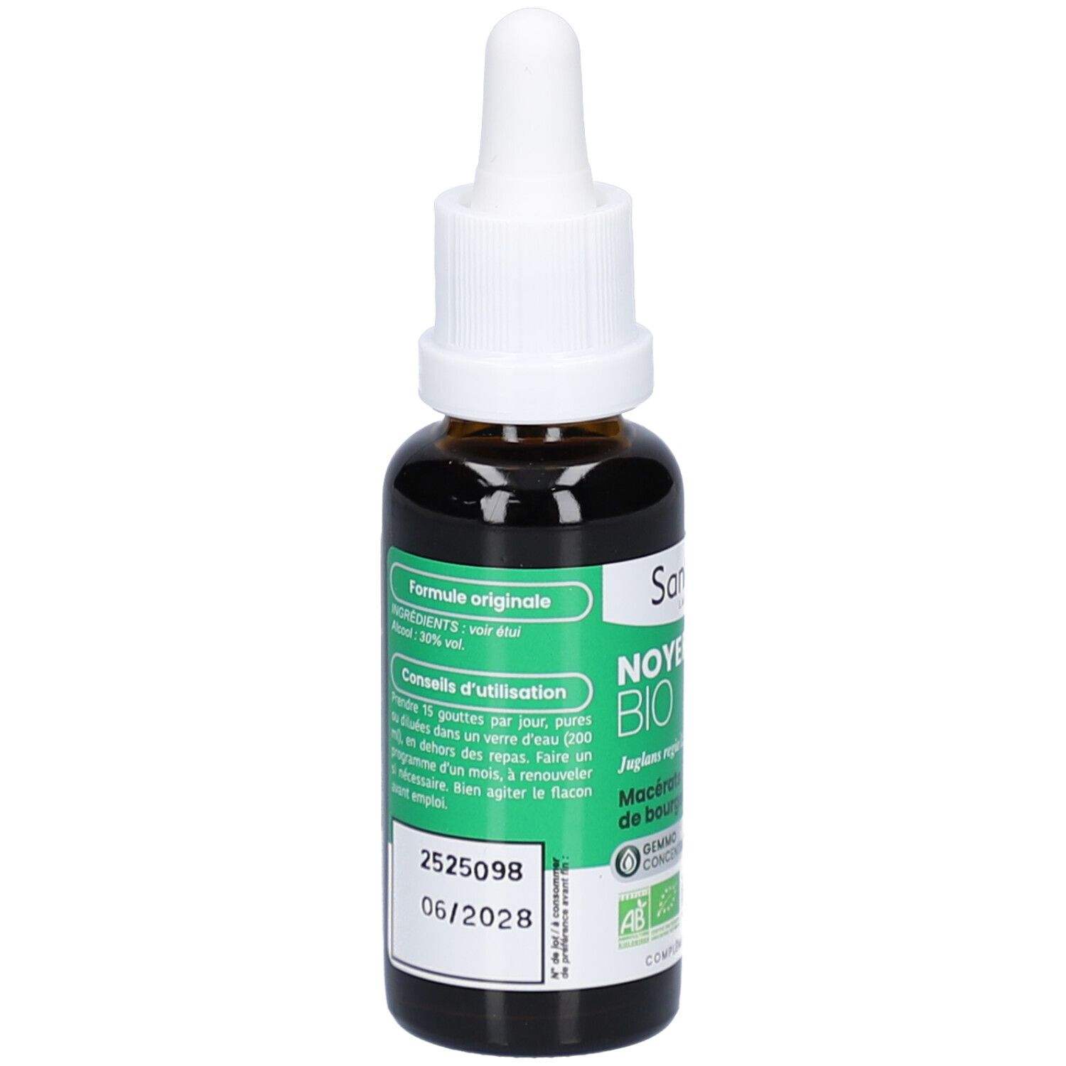 Flacon en verre brun avec compte-gouttes blanc. Étiquettes vertes avec texte. Contient des informations d'utilisation et ingrédients. Date de péremption.