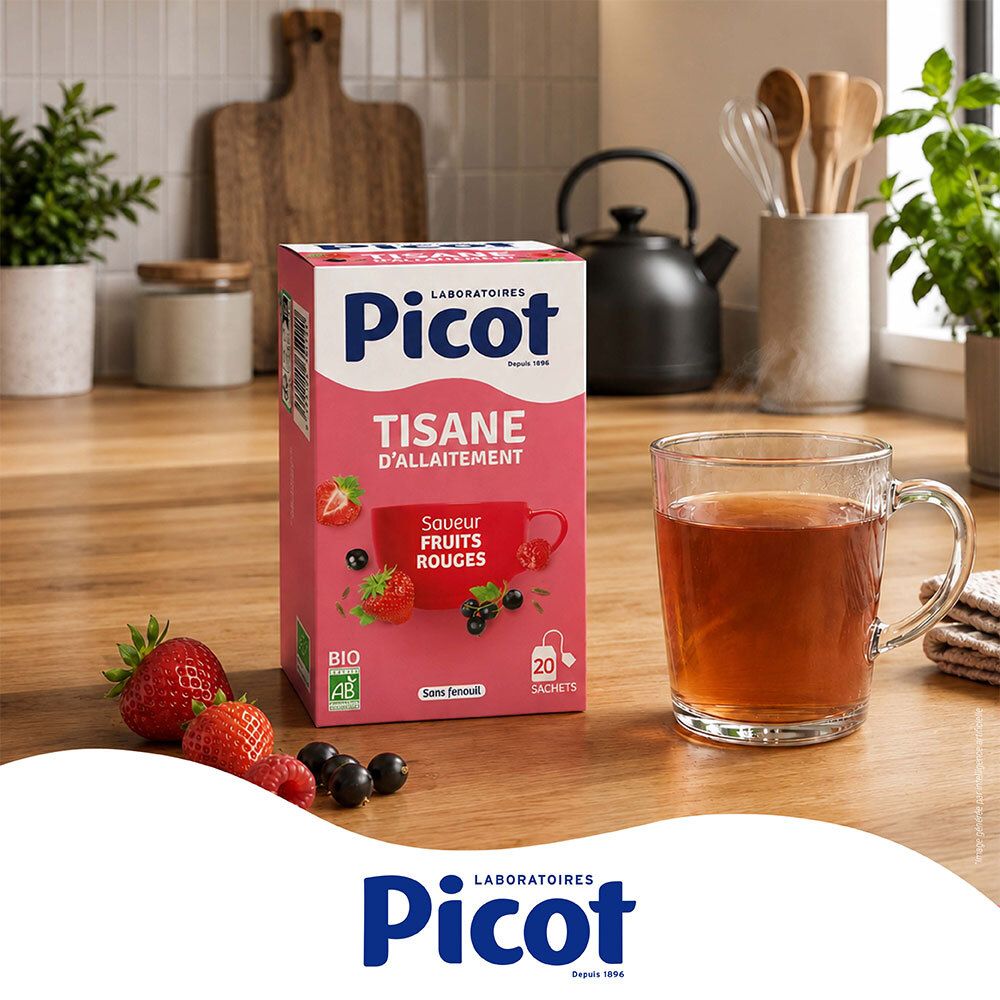 Boîte Picot Bio Tisane d'Allaitement Fruits Rouges et une tasse de thé sur une table en bois en cuisine.