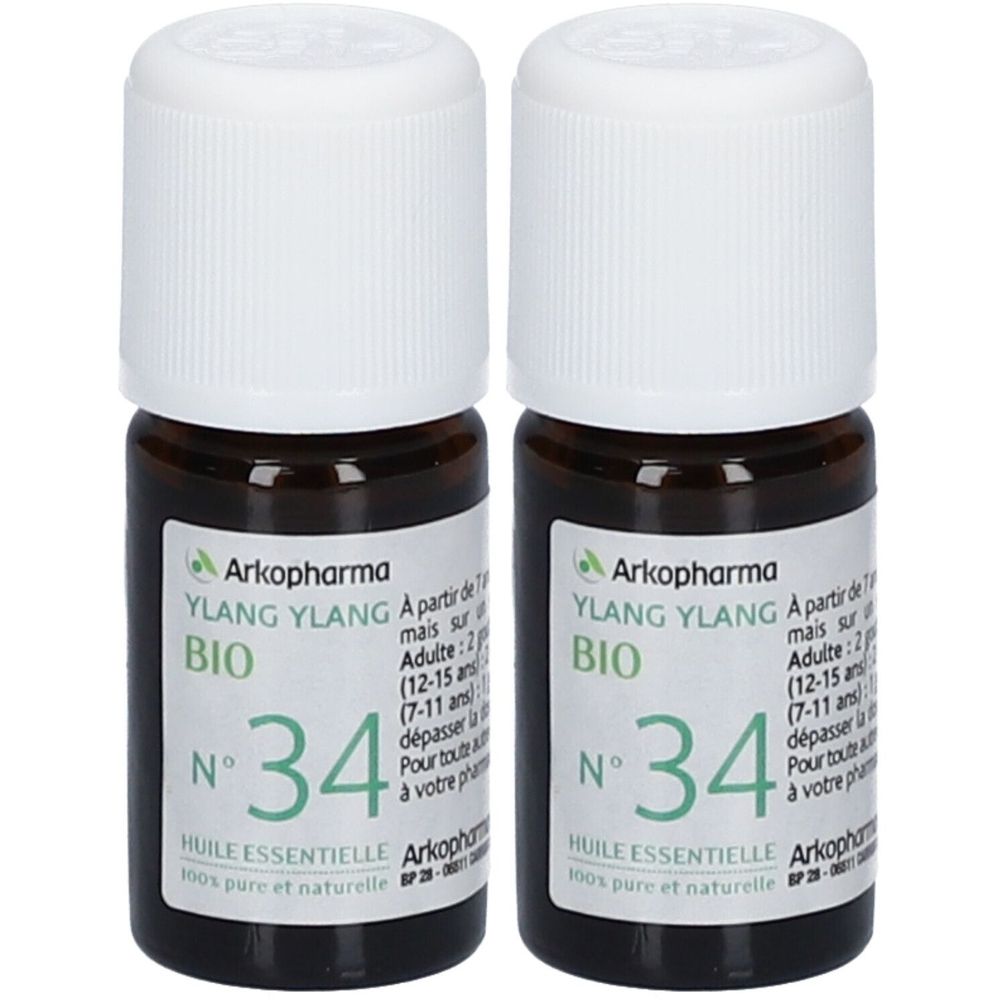 Deux flacons bruns avec bouchons blancs. Étiquettes : "Arkopharma Ylang Ylang BIO N°34".