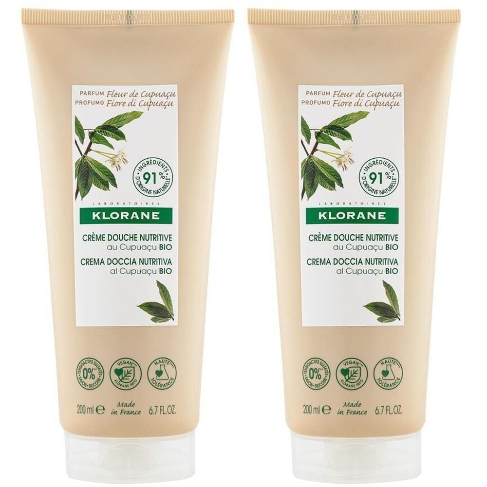 Deux tubes de KLORANE Crème Douche. Tubes beiges avec étiquette verte. Texte: Crème Douche Nutritive au Cupuaçu BIO.