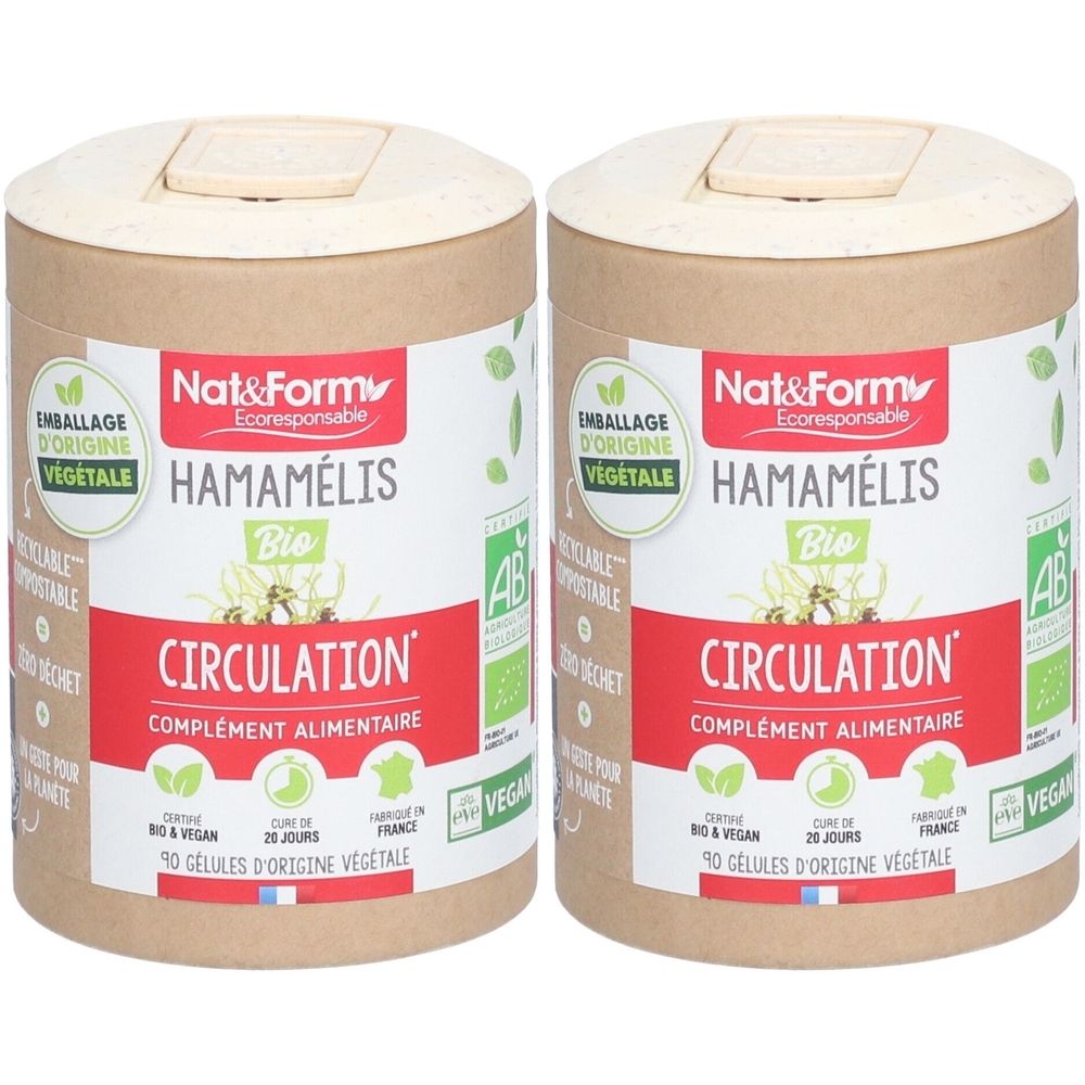 Deux boîtes cylindriques avec couvercles. Inscriptions: Hamamélis Bio, Circulation, complément alimentaire. Certifications vegan et bio.