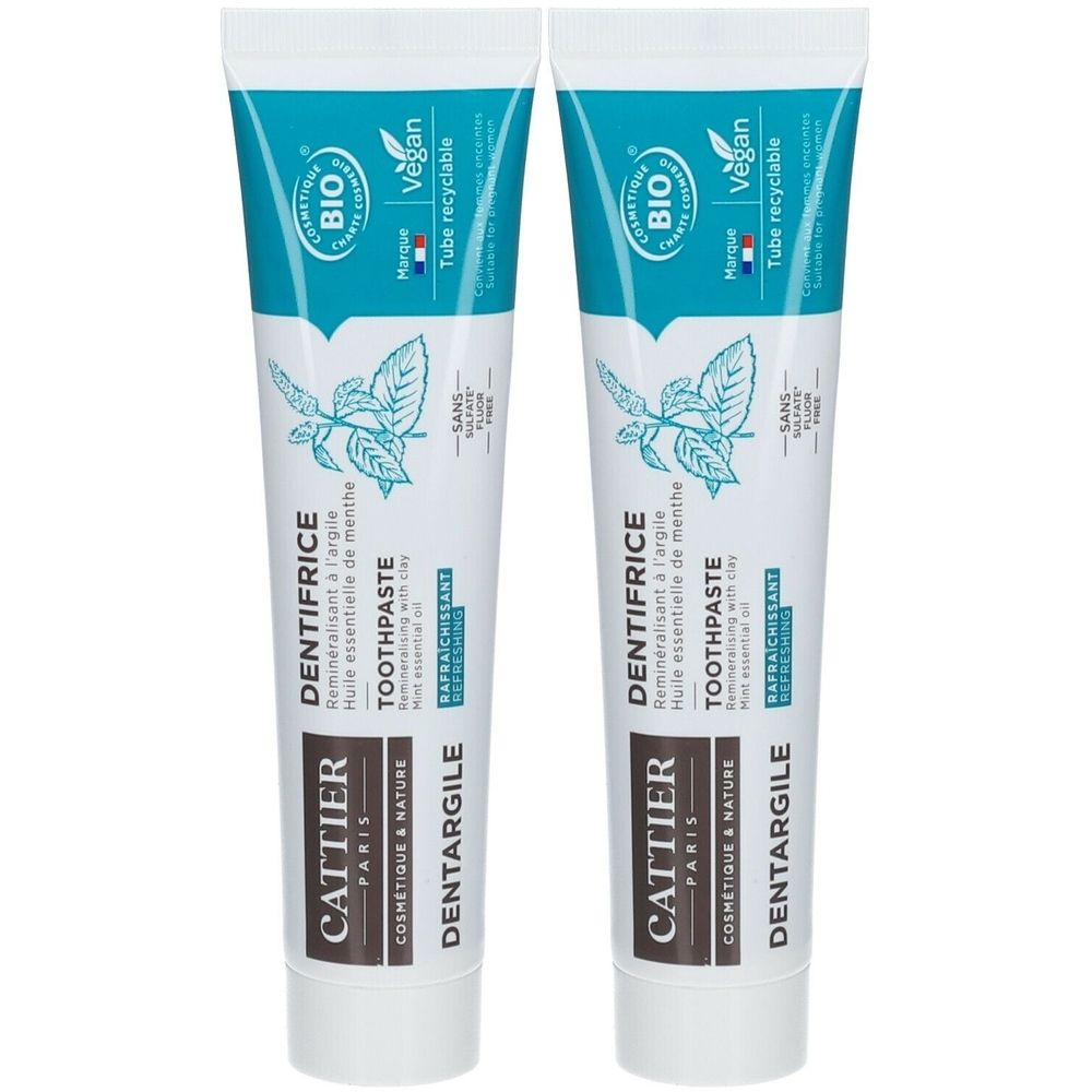Deux tubes de dentifrice Cattier Dentargile. Blanc, avec bouchon bleu et texte. Certification Bio et label Vegan.