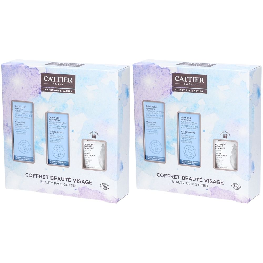 Deux coffrets cadeaux Cattier. Chaque coffret contient trois produits dans une boîte imprimée. Inscription : Cattier, Coffret Beauté Visage.