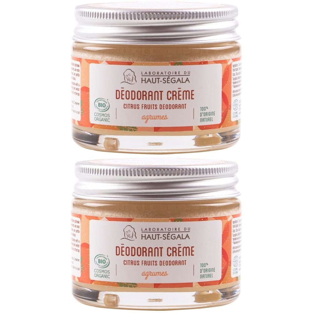 Deux pots de crème déodorante avec couvercles argentés. Étiquettes: LABORATOIRE DU HAUT-SÉGALA, DÉODORANT CRÈME, Citrus Fruits Déodorant, agrumes.