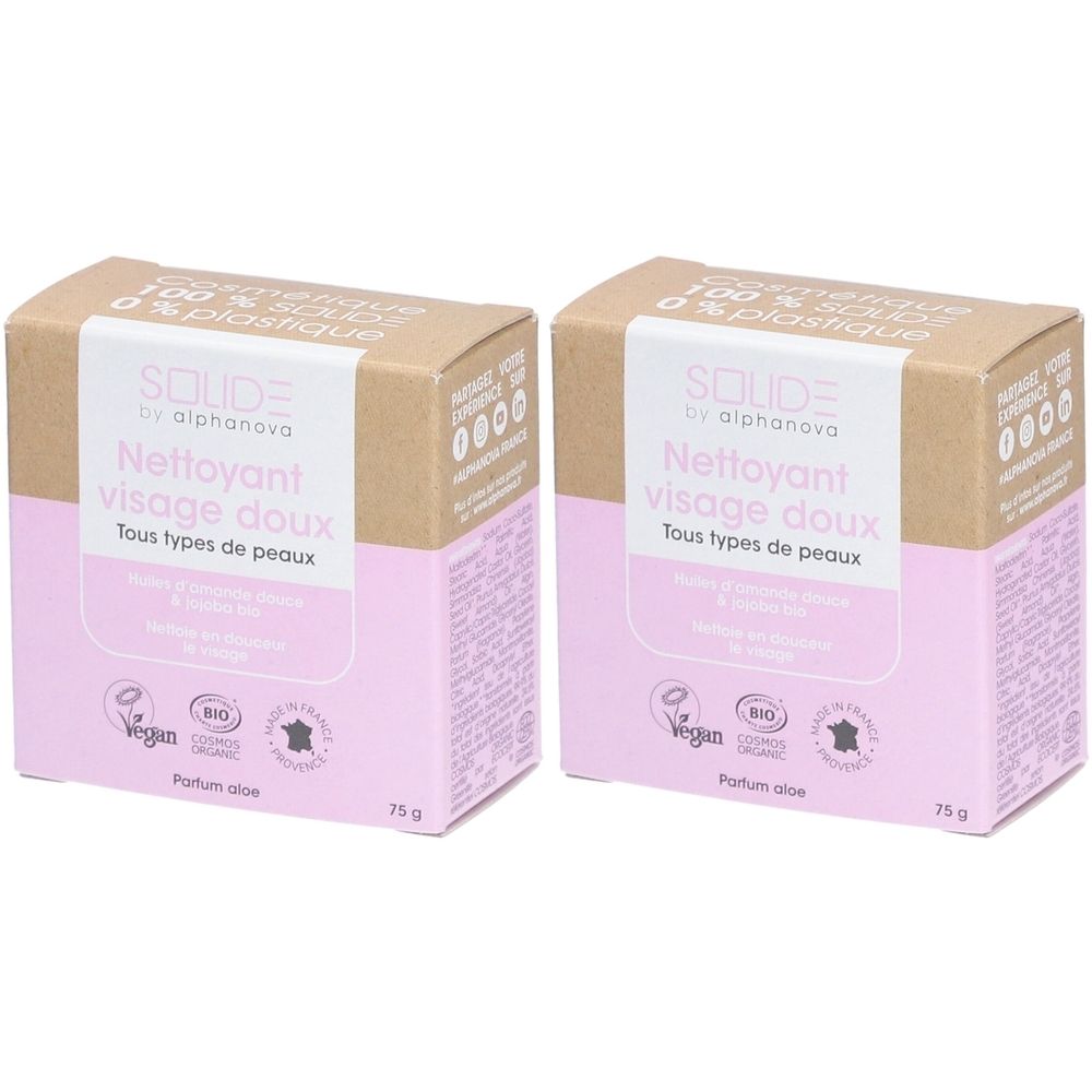 Deux boîtes carrées, rose et marron. Inscription : Nettoyant visage doux, Tous types de peaux. Logo vegan.