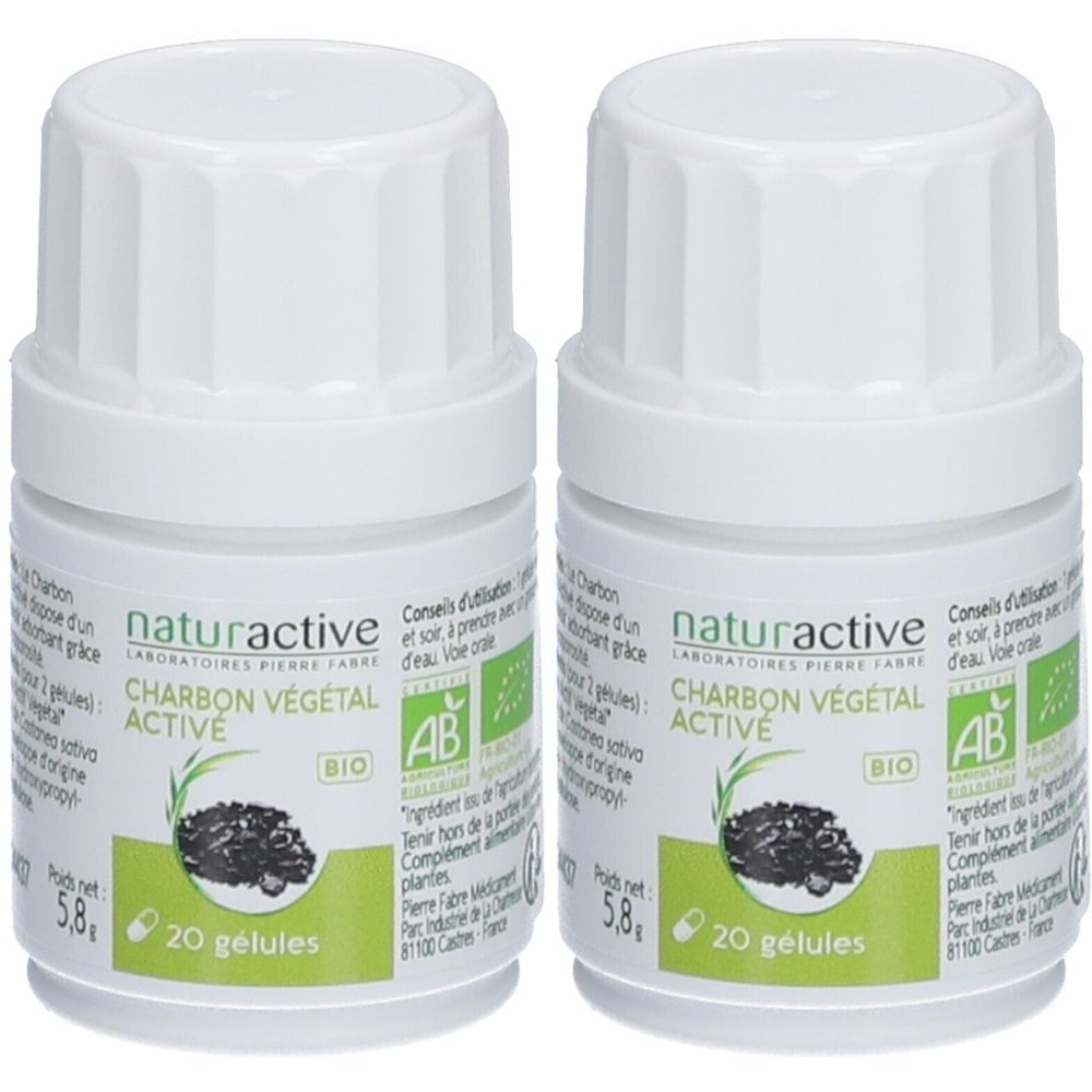 Deux flacons blancs avec bouchons à vis. Étiquettes avec "CHARBON VÉGÉTAL ACTIVE" et logo "BIO".