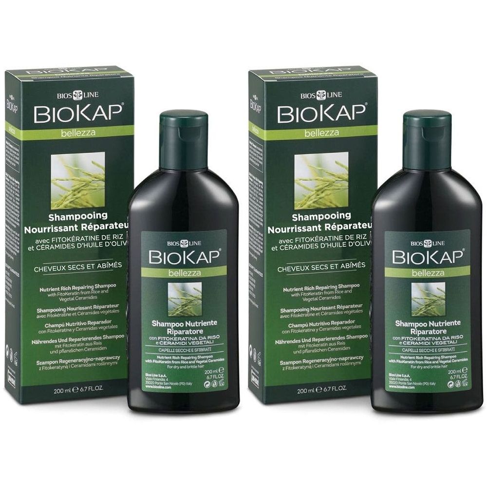 Deux flacons et deux boîtes de shampooing BIOKAP. Flacons noirs avec bouchon vert. Boîtes vertes avec informations produit.