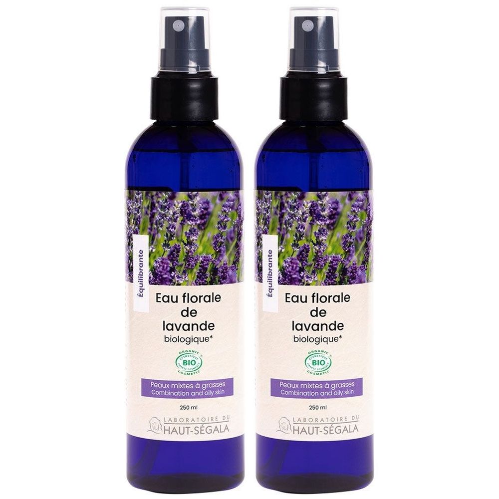 Deux flacons bleus avec vaporisateur. Étiquettes avec "Eau florale de lavande biologique". Label bio visible.