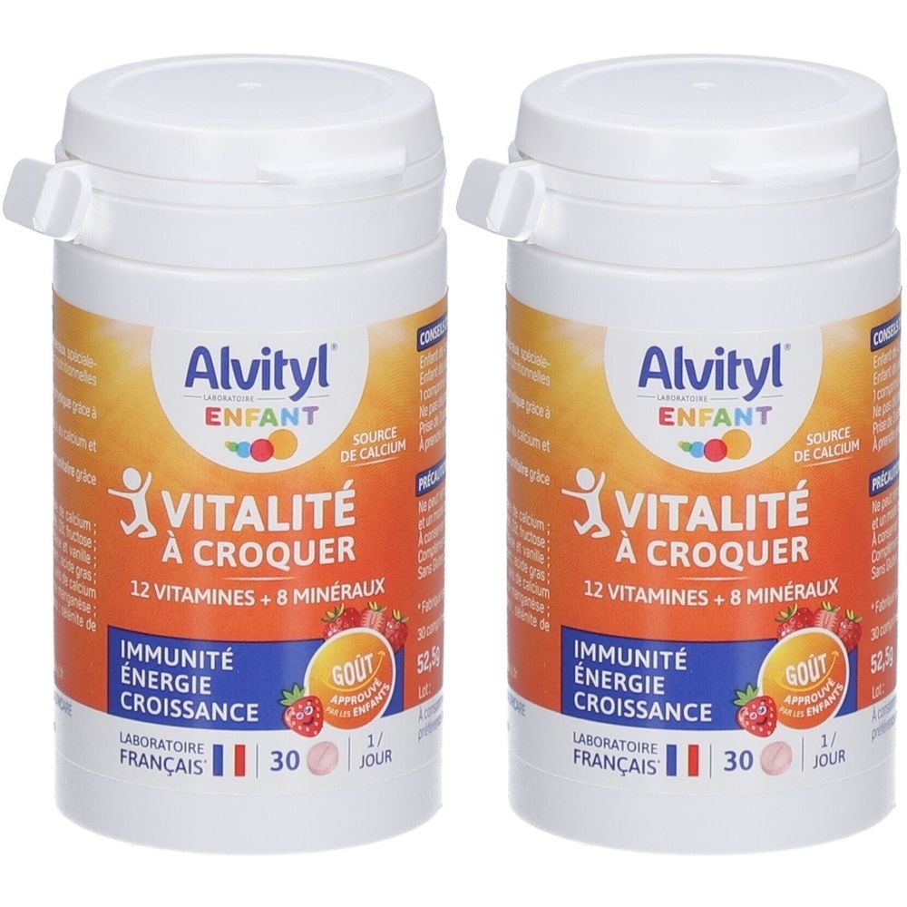 Deux flacons blancs avec couvercles. Inscription: Alvityl ENFANT, Vitalité à croquer, 12 vitamines + 8 minéraux. Laboratoire français. Goût fraise.