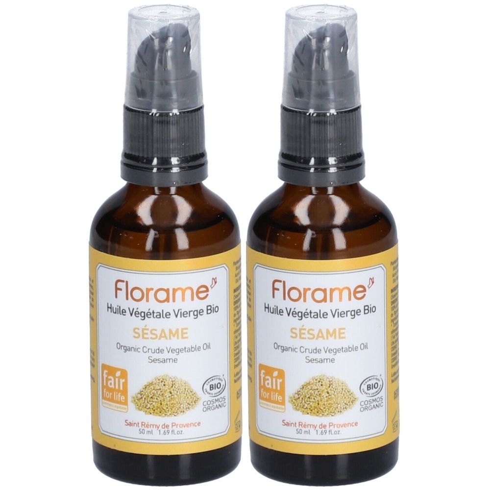 Deux flacons en verre brun avec pompe noire. Étiquettes : "Florame Huile Végétale Vierge Bio SÉSAME", certification BIO.