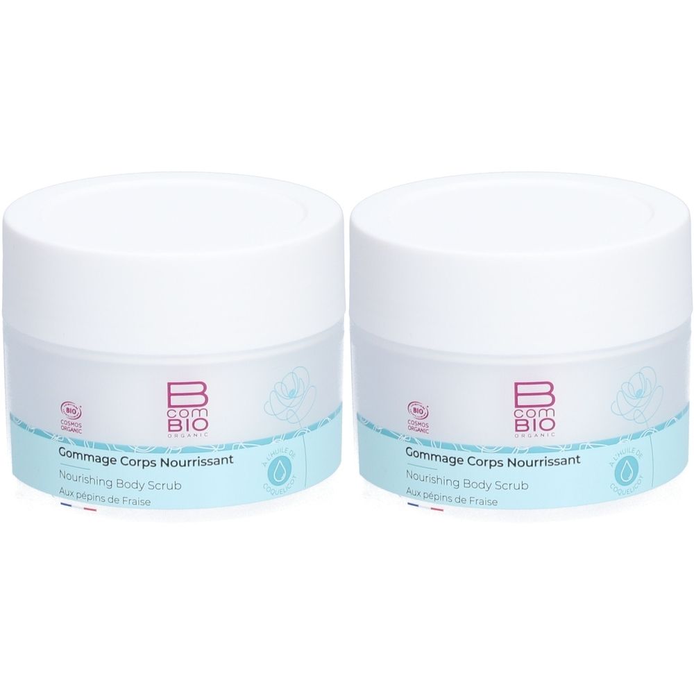 Deux pots blancs avec une étiquette bleue. L'étiquette indique "B com BIO" et "Gommage Corps Nourrissant".