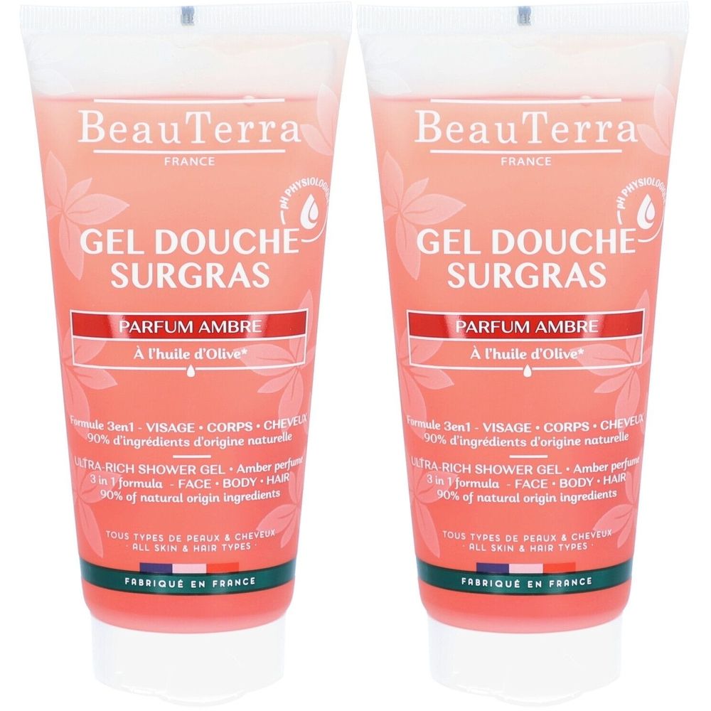 Deux tubes de gel douche BeauTerra Surgras, Ambre. Liquide rose, bouchon blanc. Texte: Parfum Ambre, à l'huile d'Olive.