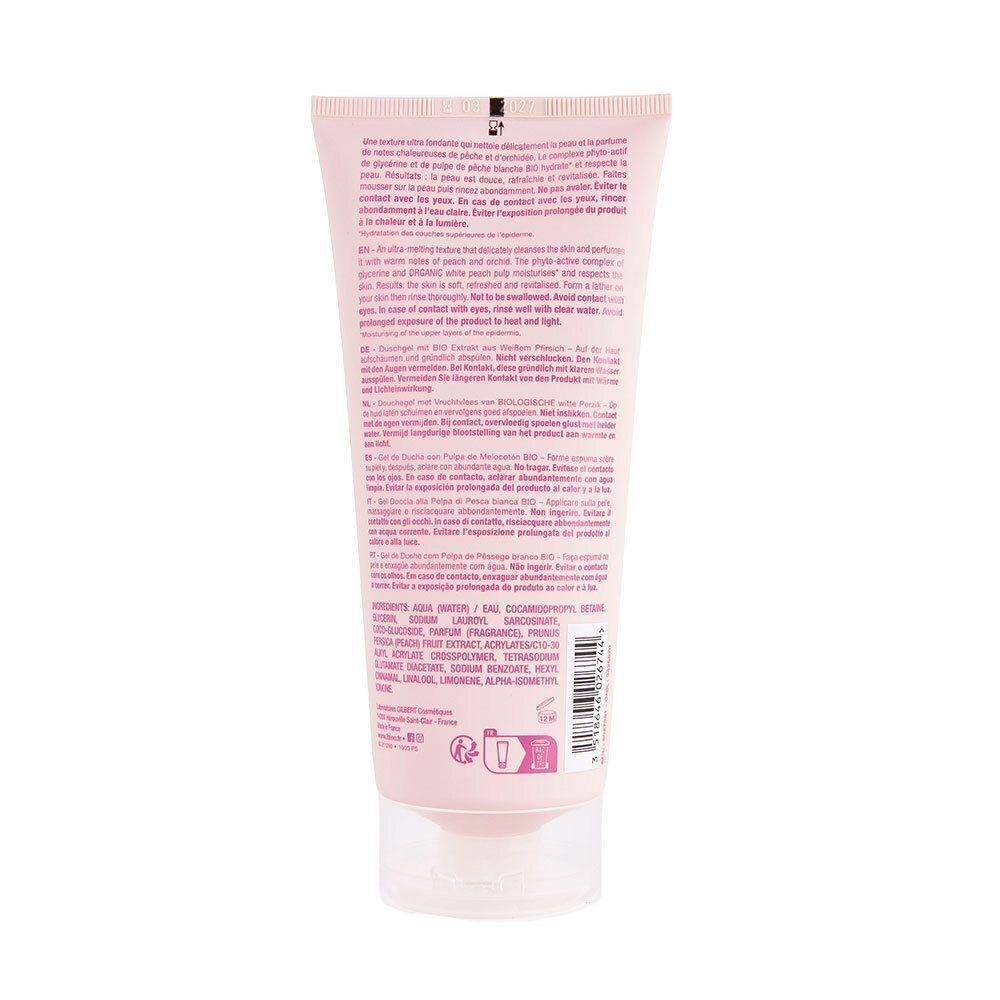 Tube rose avec texte multilingue. Bouchon transparent. Informations produit et ingrédients.