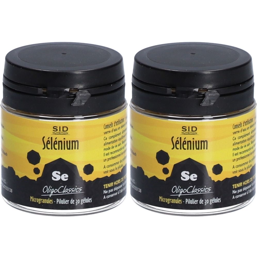 Deux pots de S.I.D. Sélénium. Couvercles noirs, étiquettes jaunes avec texte. Inscription : Sélénium, Se, OligoClassics, Microgranules.