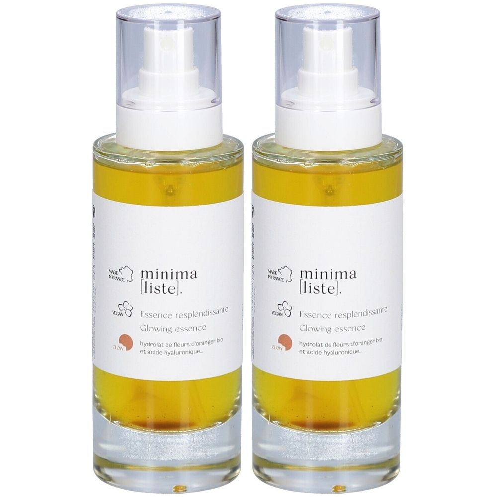 Deux flacons en verre avec vaporisateur. Étiquettes avec texte : minima liste, Essence resplendissante, Glowing essence. Liquide jaune.