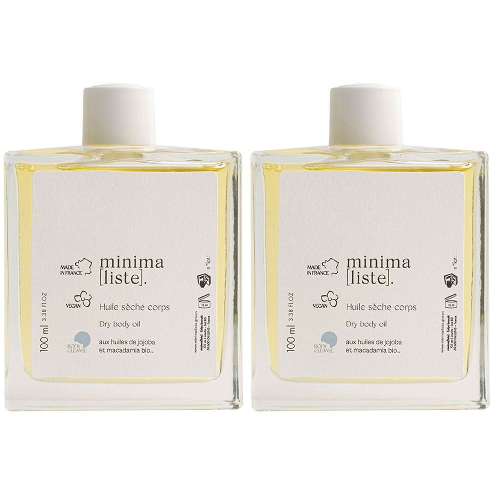 Deux flacons carrés en verre avec bouchon blanc. L'étiquette indique "minima [liste]" et "Huile sèche corps".