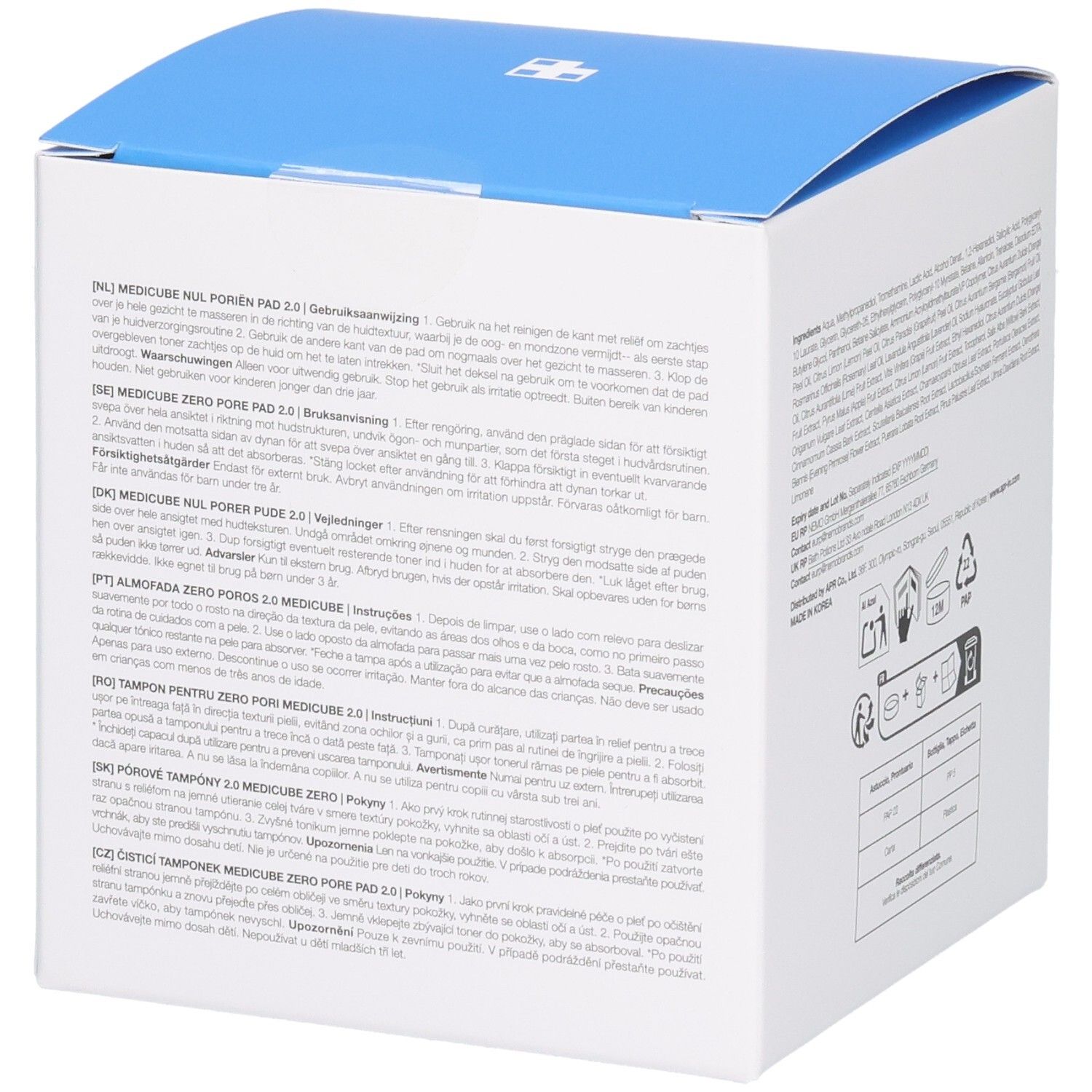 Boîte carrée blanche à couvercle bleu. Texte multilingue, symboles de recyclage et instructions d'utilisation.