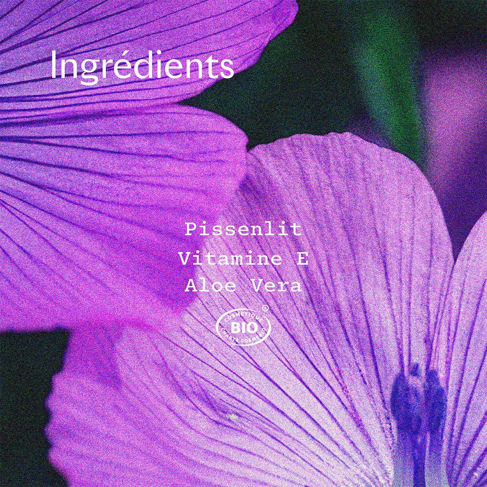 Gros plan de fleurs violettes. Texte: Ingrédients: Pissenlit, Vitamine E, Aloe Vera. Certification bio.