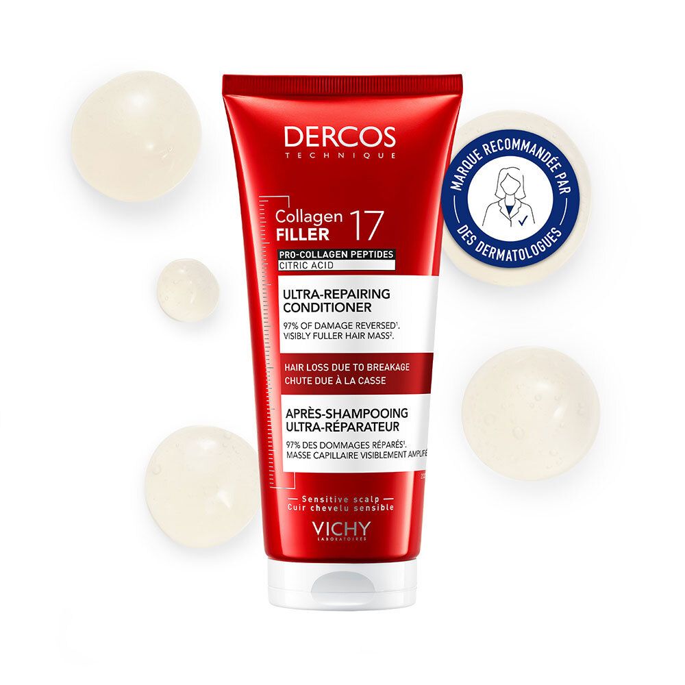 Tube rouge avec des billes blanches et un autocollant rond avec du texte.